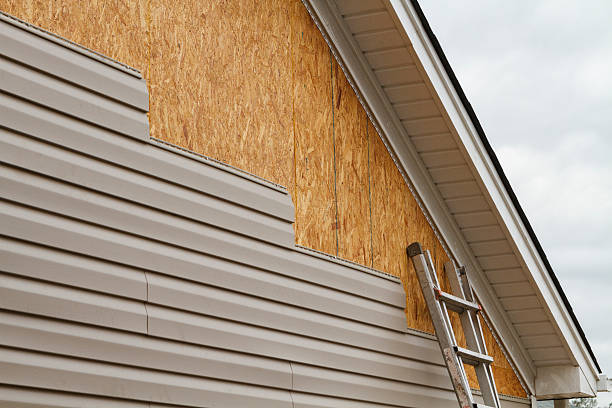 Professional Emergency Siding Repair technician working in Irondale, OH